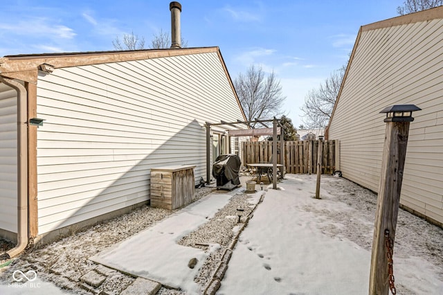 view of home's exterior featuring a pergola