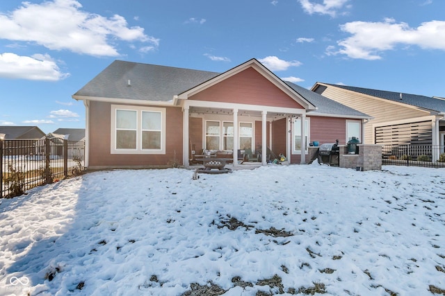 view of snow covered house