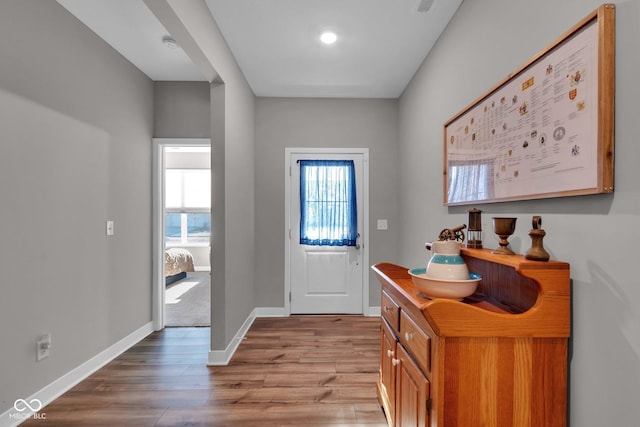 entryway with light hardwood / wood-style floors