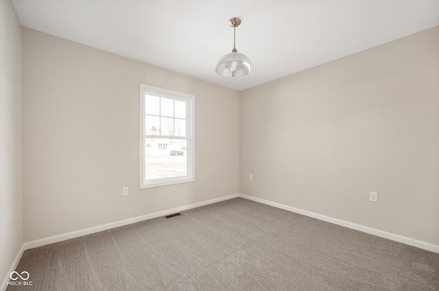 unfurnished room with carpet