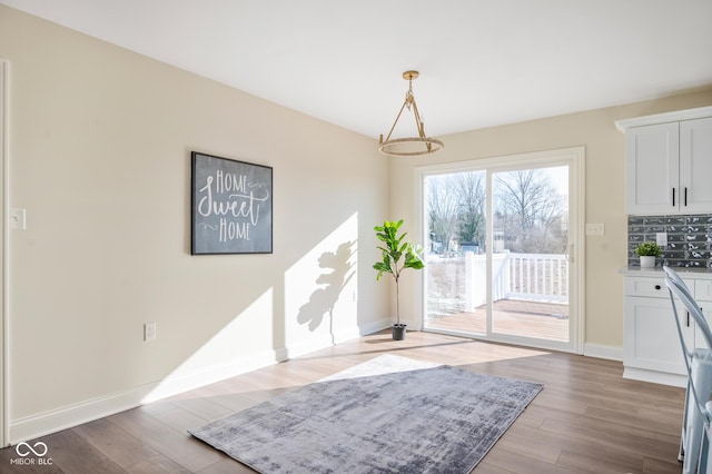 doorway featuring hardwood / wood-style flooring