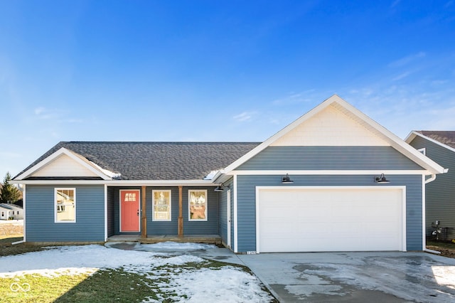 ranch-style home featuring a garage