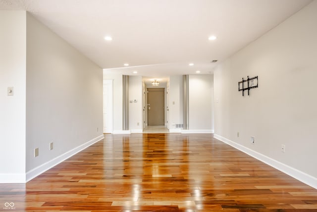 spare room with light hardwood / wood-style floors