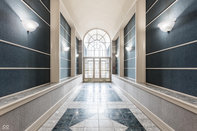 hall with tile patterned flooring