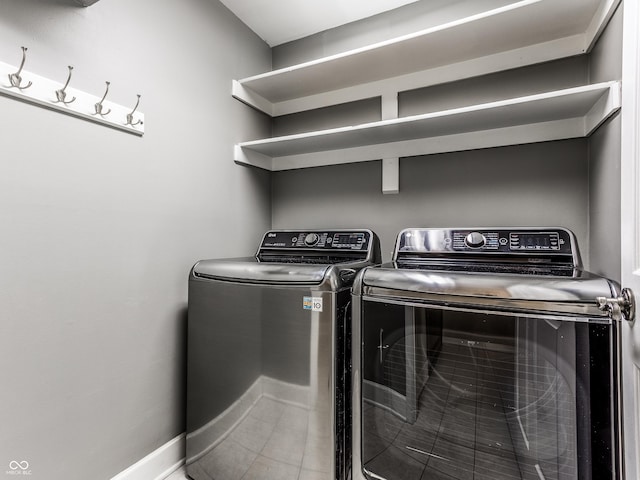 washroom with separate washer and dryer