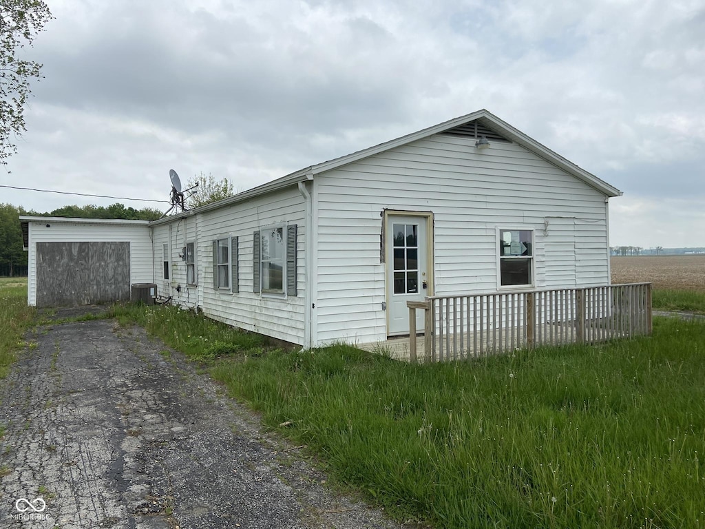 view of home's exterior featuring central air condition unit