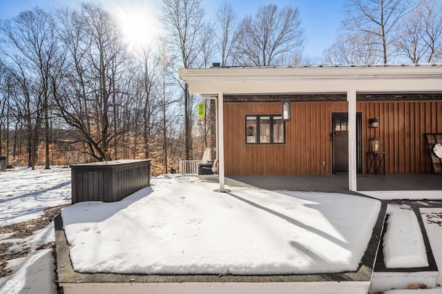 view of snow covered patio