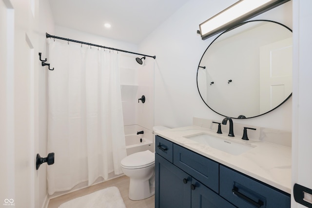 full bathroom with vanity, toilet, and shower / bath combo