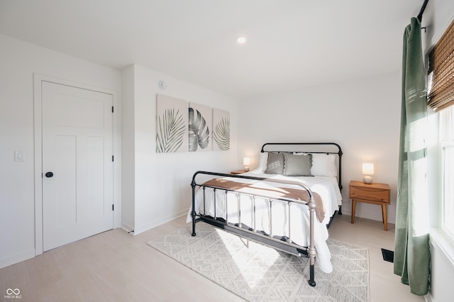 bedroom featuring light wood-type flooring