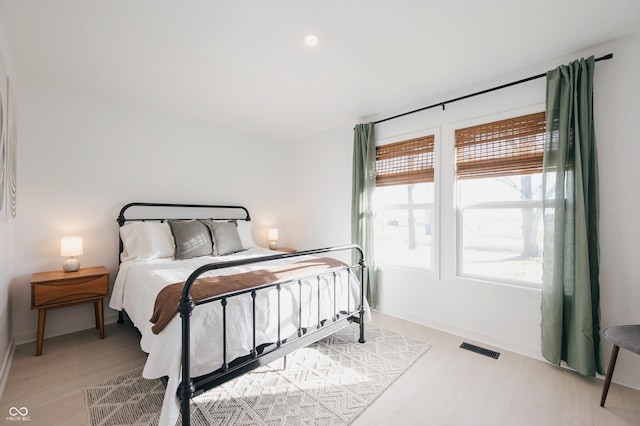 bedroom featuring light hardwood / wood-style floors