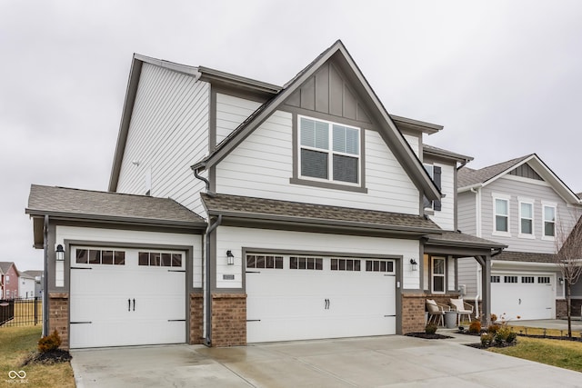 view of front of house with a garage and covered porch