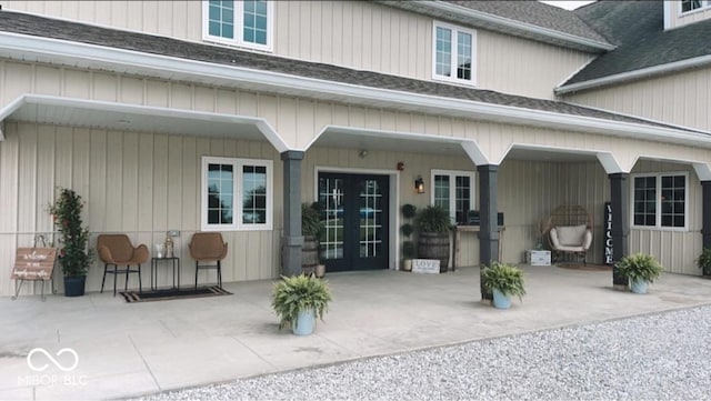 back of house featuring french doors