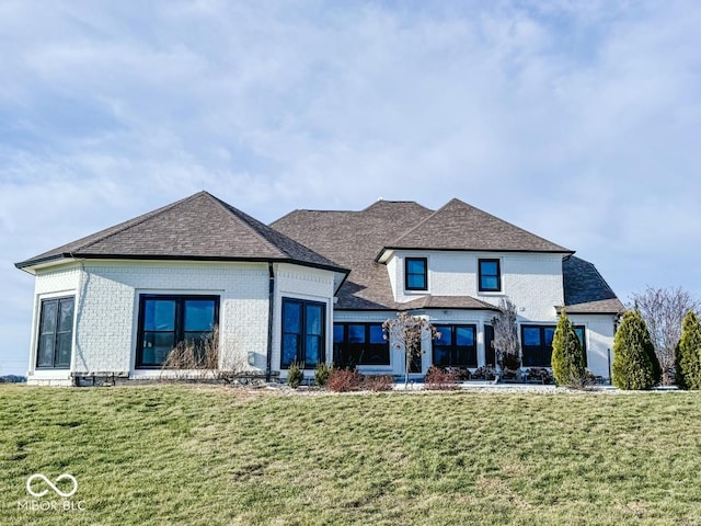 view of front of home with a front yard