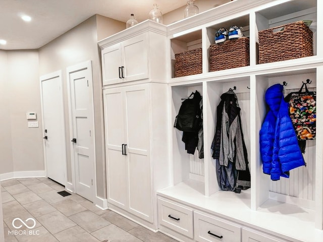 mudroom featuring light tile patterned floors