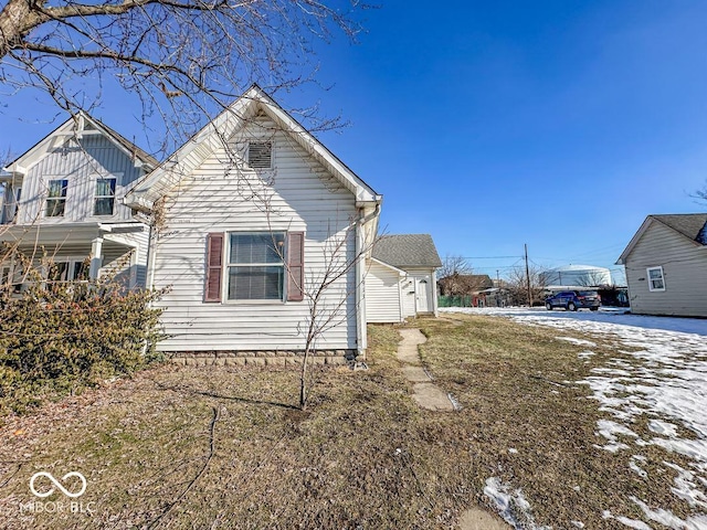 view of property exterior with a yard