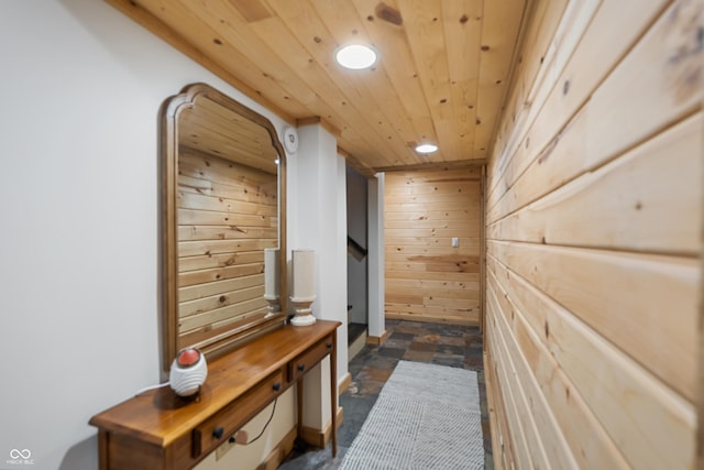 hall with wooden ceiling and wooden walls