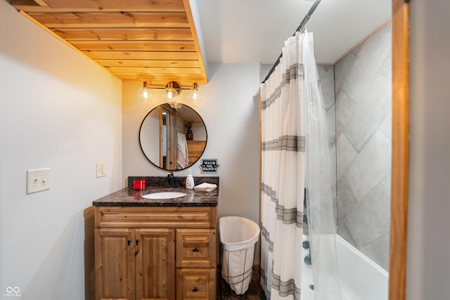 bathroom with shower / bath combo, wooden ceiling, and vanity