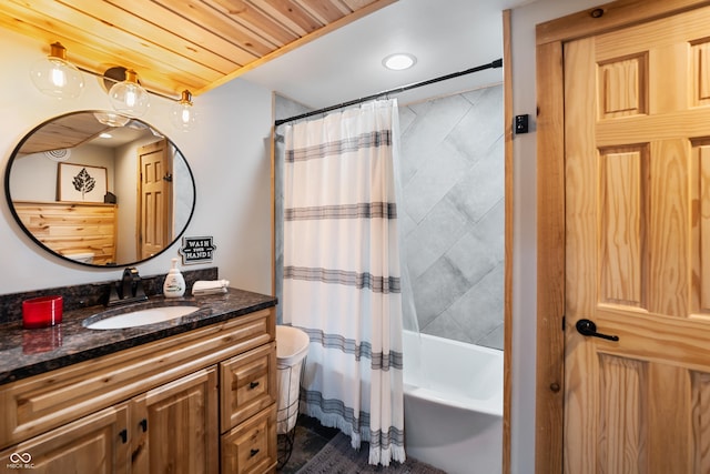 bathroom with wood ceiling, vanity, and shower / bath combo