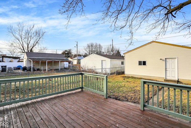 wooden deck with a yard