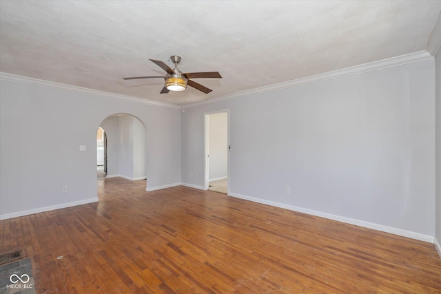 empty room with crown molding, ceiling fan, hardwood / wood-style floors, and a textured ceiling