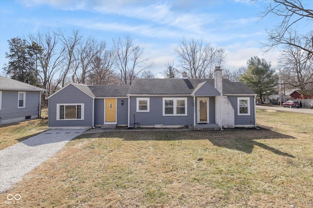 ranch-style house with a front lawn