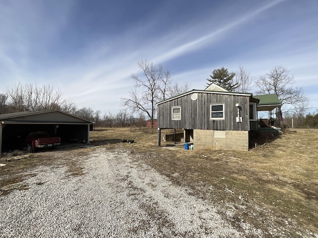 exterior space featuring a carport