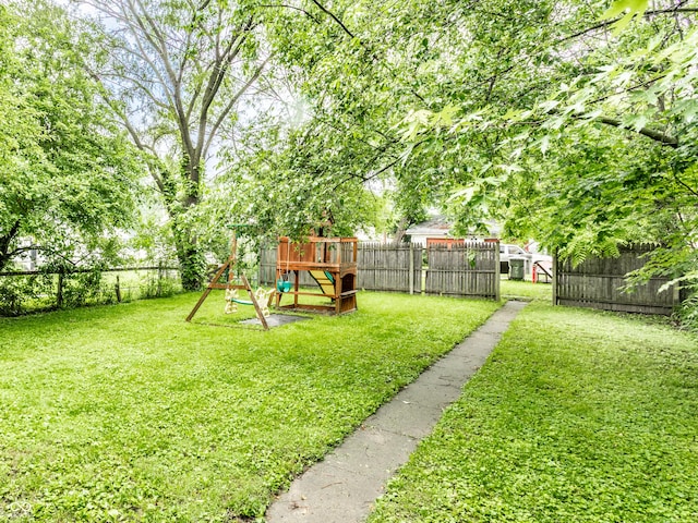 361 S Spencer Ave, Indianapolis, IN 46219 - view of yard with a playground
