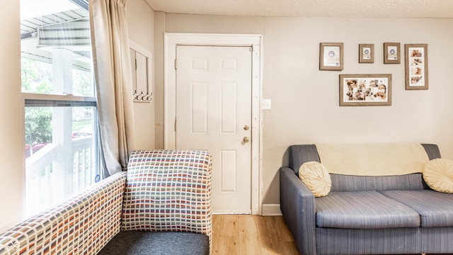 361 S Spencer Ave, Indianapolis, IN 46219 - sitting room with wood finished floors and baseboards