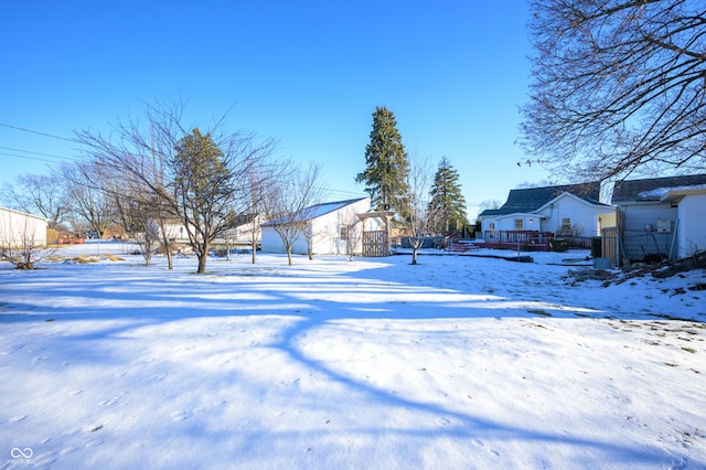 view of yard covered in snow