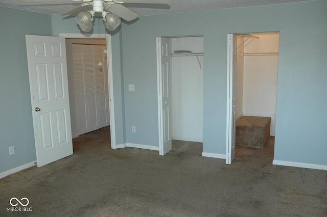 unfurnished bedroom with ceiling fan and carpet flooring