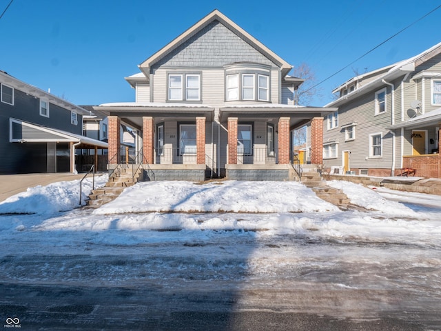 view of front of property featuring covered porch