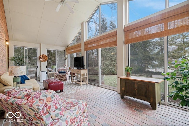 sunroom with vaulted ceiling and ceiling fan