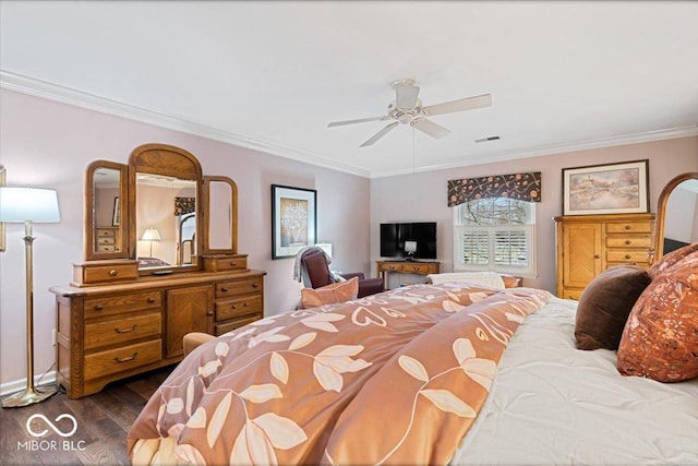 bedroom with crown molding, dark wood-type flooring, and ceiling fan