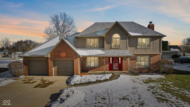 front facade with a garage