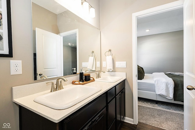 bathroom featuring vanity and wood-type flooring