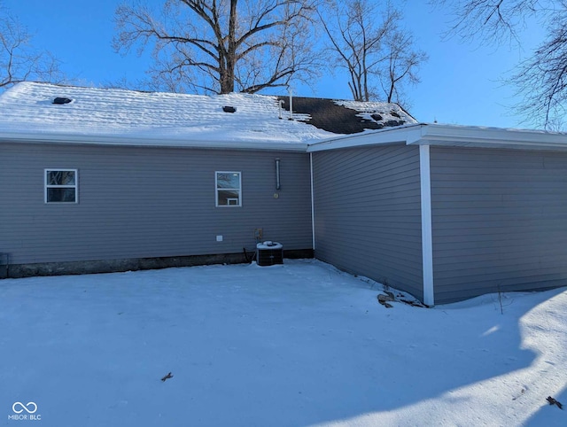 view of snow covered property