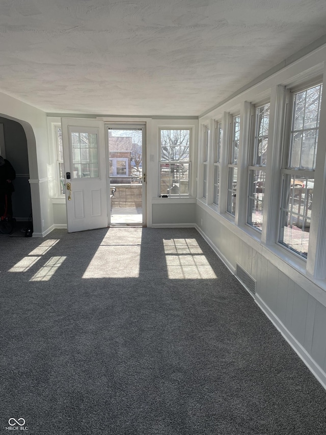 view of unfurnished sunroom