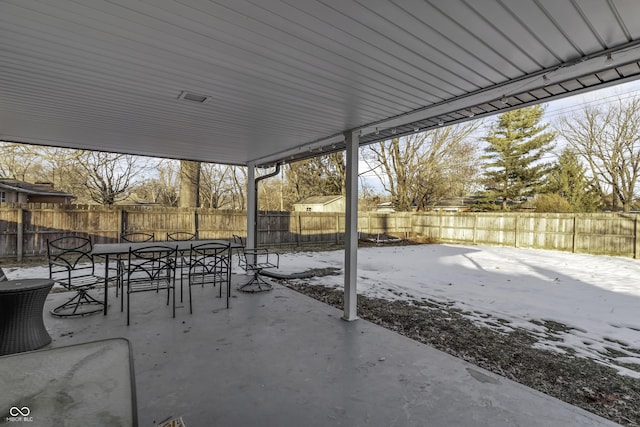 view of snow covered patio