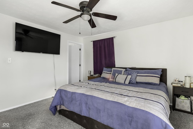 bedroom featuring ceiling fan and carpet