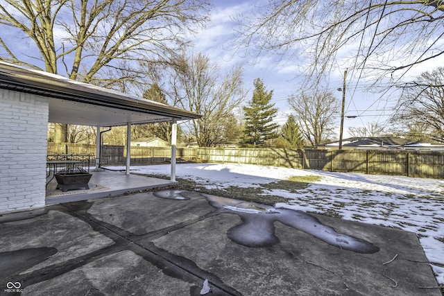 view of snow covered patio