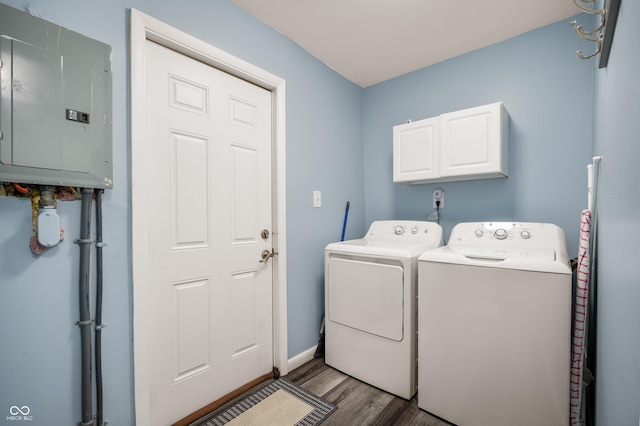1130 S Senate Ave, Indianapolis, IN 46225 - laundry room with cabinets, washer and dryer, electric panel, and dark hardwood / wood-style flooring