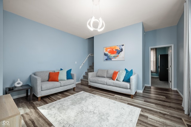 1130 S Senate Ave, Indianapolis, IN 46225 - living room with dark wood-type flooring and a chandelier