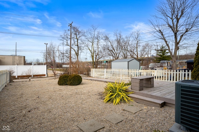 1130 S Senate Ave, Indianapolis, IN 46225 - view of yard with a wooden deck and central air condition unit
