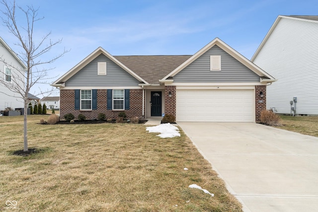 view of front of home with a garage and a front lawn