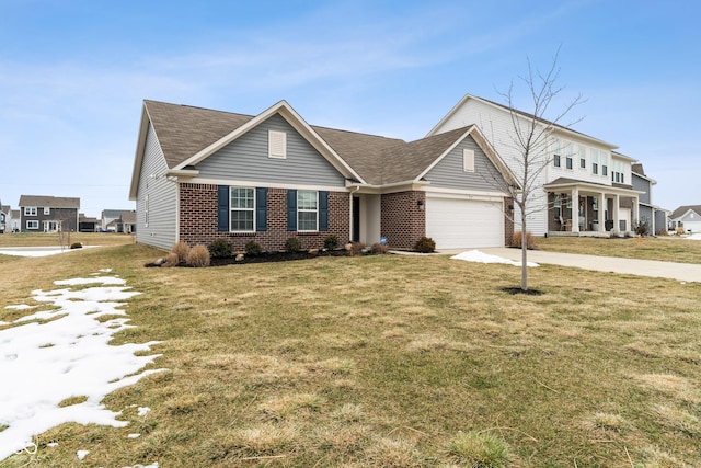 view of front of property featuring a garage and a front lawn