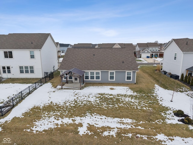 view of snow covered house