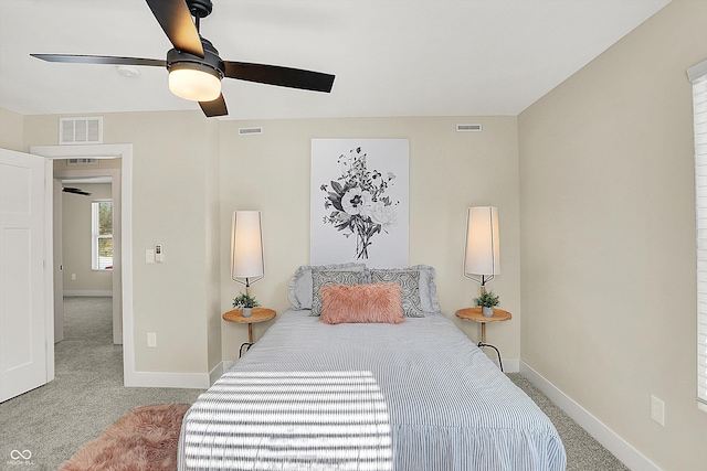 carpeted bedroom featuring ceiling fan