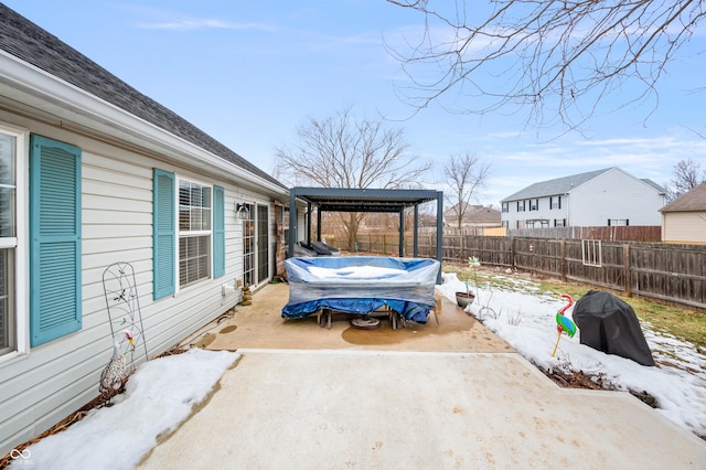 view of snow covered patio