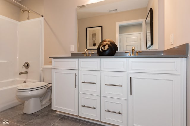 full bathroom featuring vanity, tile patterned flooring, tub / shower combination, and toilet