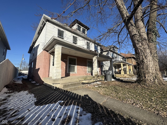 view of front of property featuring covered porch